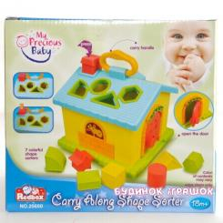 Розвивальні іграшки - Розвиваючий будиночок-сортер Redbox (25650)