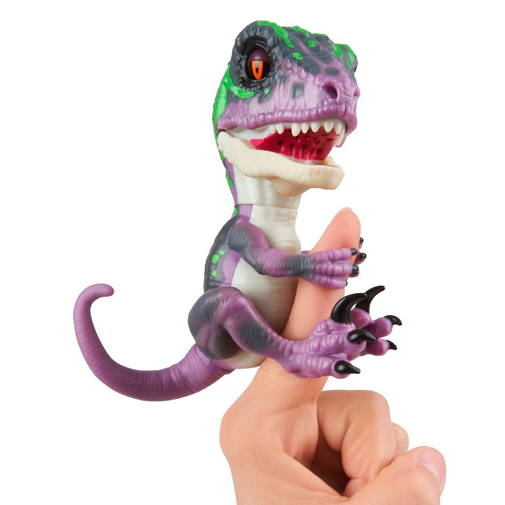 

Интерактивная игрушка Fingerlings Динозавр Рейзор фиолетовый 12 см (W3780/3784)