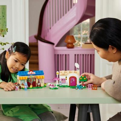 Конструкторы LEGO - Конструктор LEGO Animal Crossing Ятка «Nook's Cranny» и дом Rosie (77050)#5