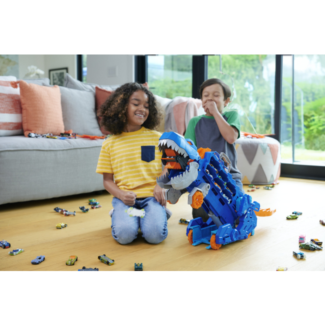 Транспорт і спецтехніка - Мега-транспортер Hot Wheels City Неймовірний Ті-рекс 2 в 1 (HNG50)#7